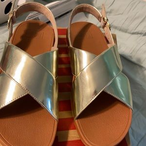 FitFlop Lulu cross back strap sandals.